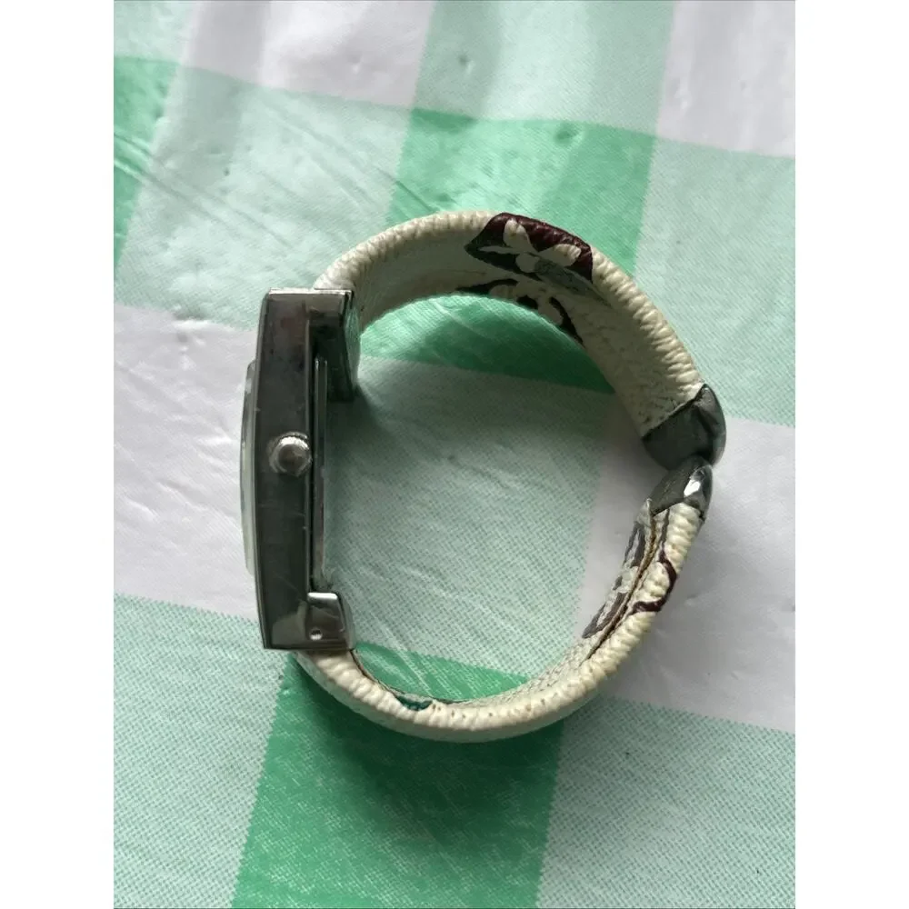 Geneva Silver Tone Multicolored Band Women’s Cuff Watch